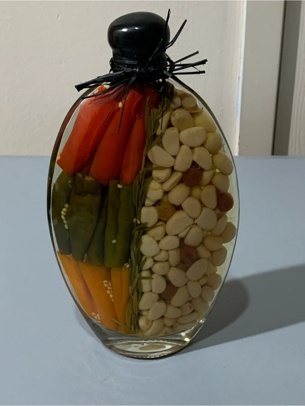 Glass Accent Bottle with Red, Green, Orange Peppers and White Beans